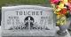 Headstone of Wilfred Touchet and Helen Cabrol Touchet